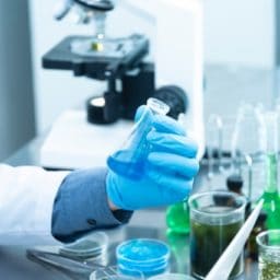 scientist holding a lab flask