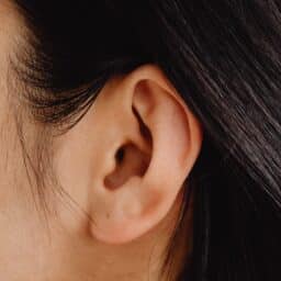 Close up of a woman's ear.