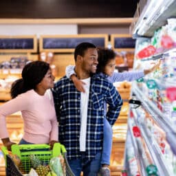 Family grocery shopping together