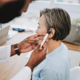 Woman gets ear examined